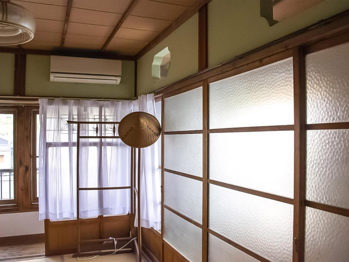 Guest Cafe Kuchikumano Kamitondacho Exterior foto