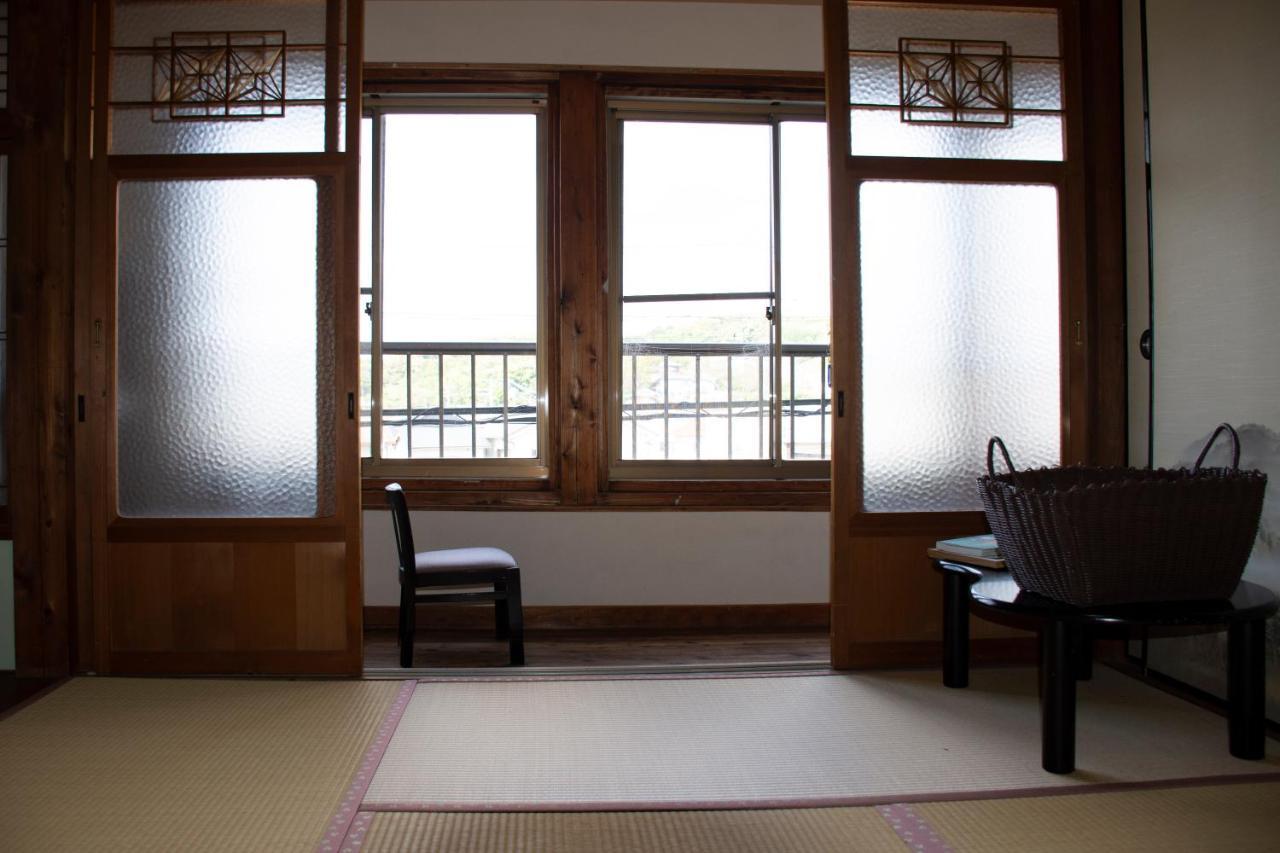 Guest Cafe Kuchikumano Kamitondacho Exterior foto